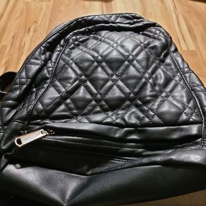 Steve Madden black backpack purse. Used.